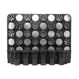 Black plastic tray with multiple circular compartments on a white background